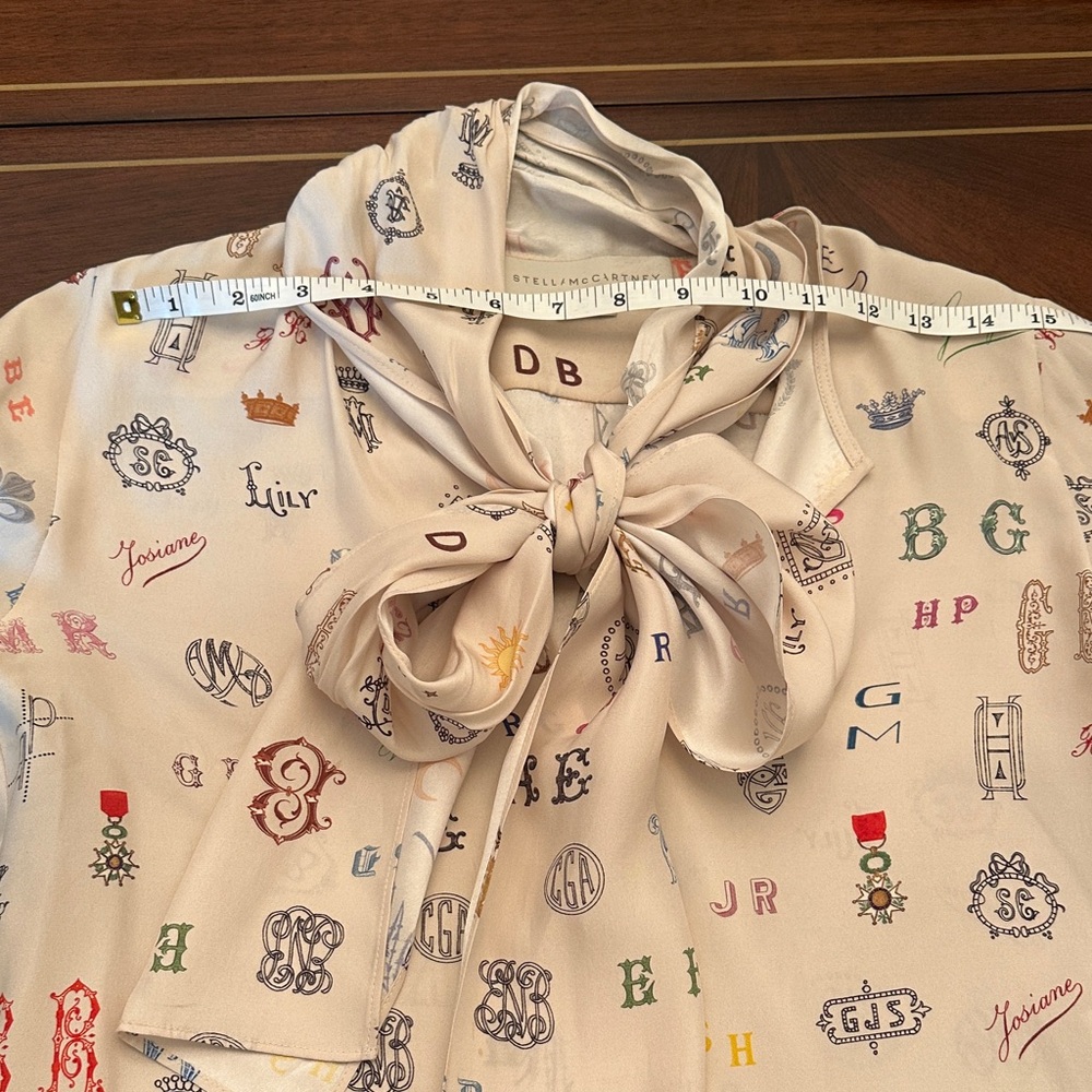 Stella McCartney Designer Monogram Print Bow-Tie Blouse – Cream Silk-Feel Top - Picture 4 of 9